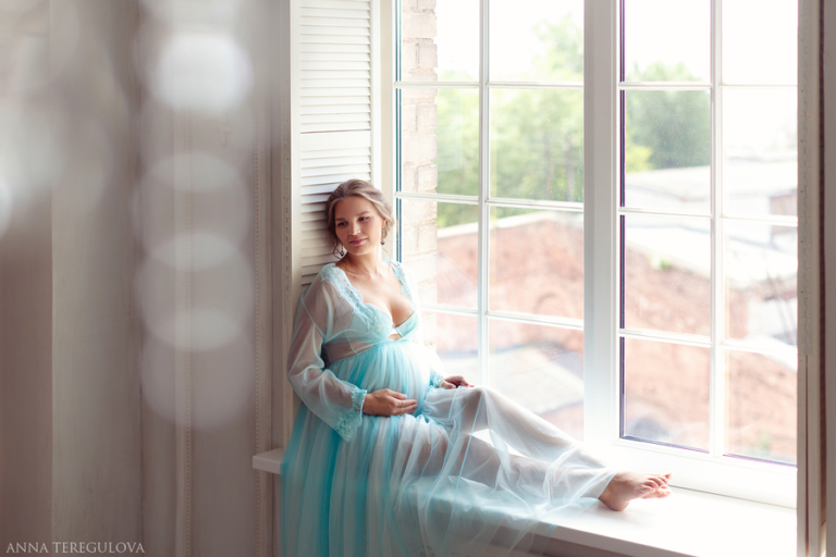 Pregnant photo shoot of Lyubov in boudoir dress Vivienne