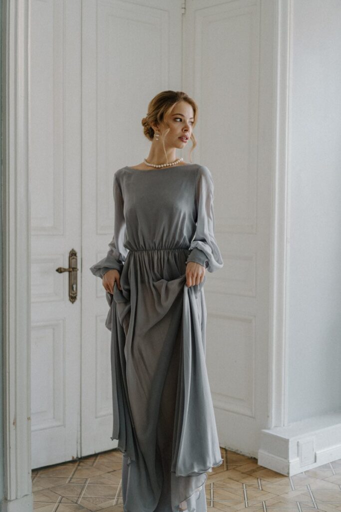 Photo Bride in a gray Nirvana wedding dress