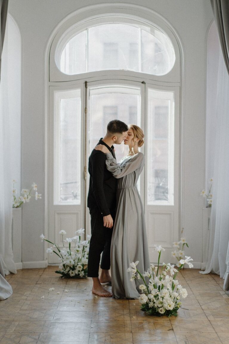 Bride in a gray Nirvana wedding dress