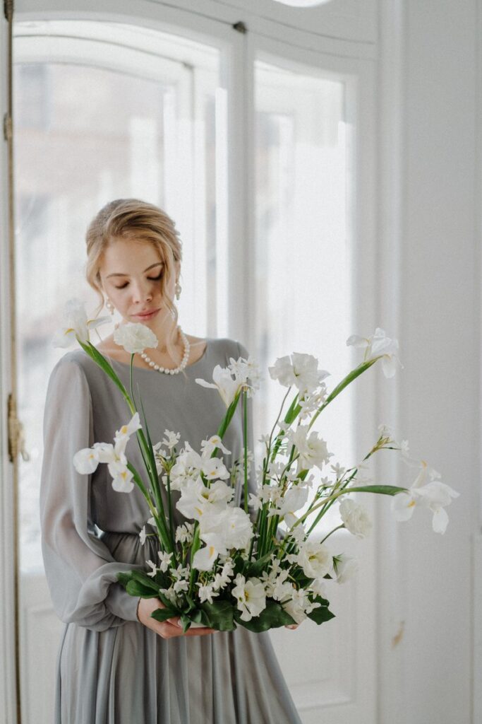 Photo Bride in a gray Nirvana wedding dress