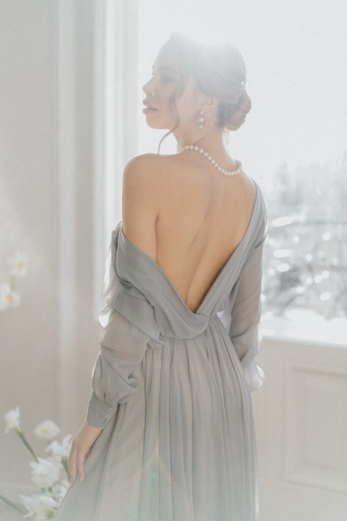 Photo Bride in a gray Nirvana wedding dress