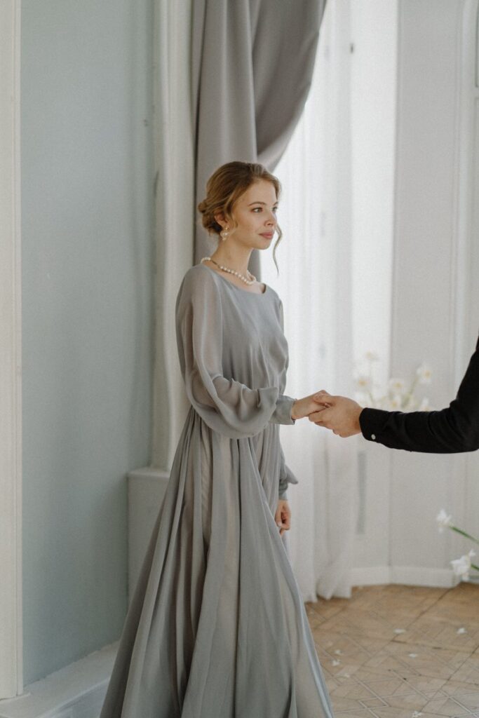 Photo Bride in a gray Nirvana wedding dress