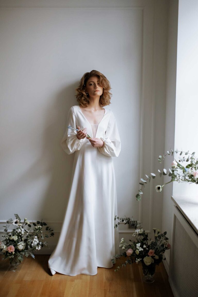 Bride in ivory Tiffany wedding dress